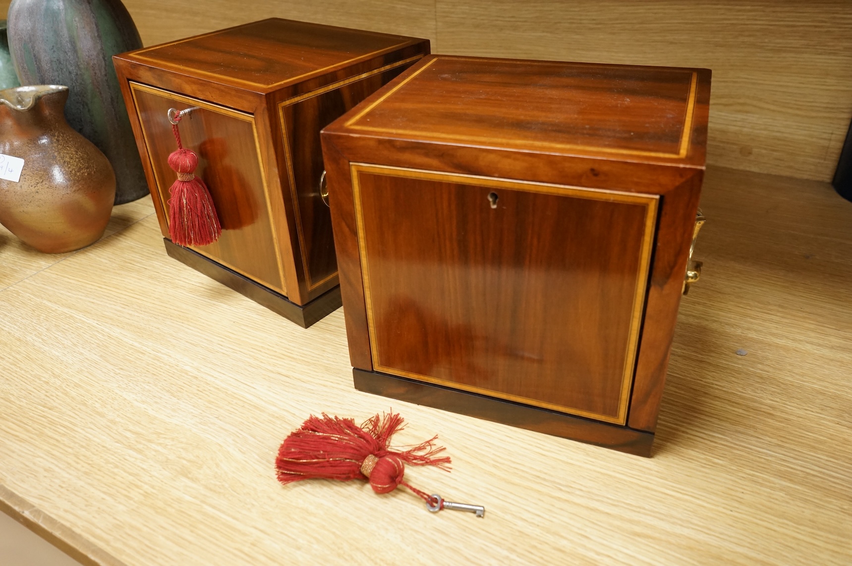 Two mahogany-cased hardstone mahjong sets, 22.5cm tall